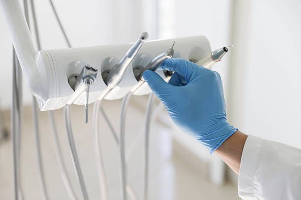 Professional Tooth Extraction technician working in Level Plains, AL